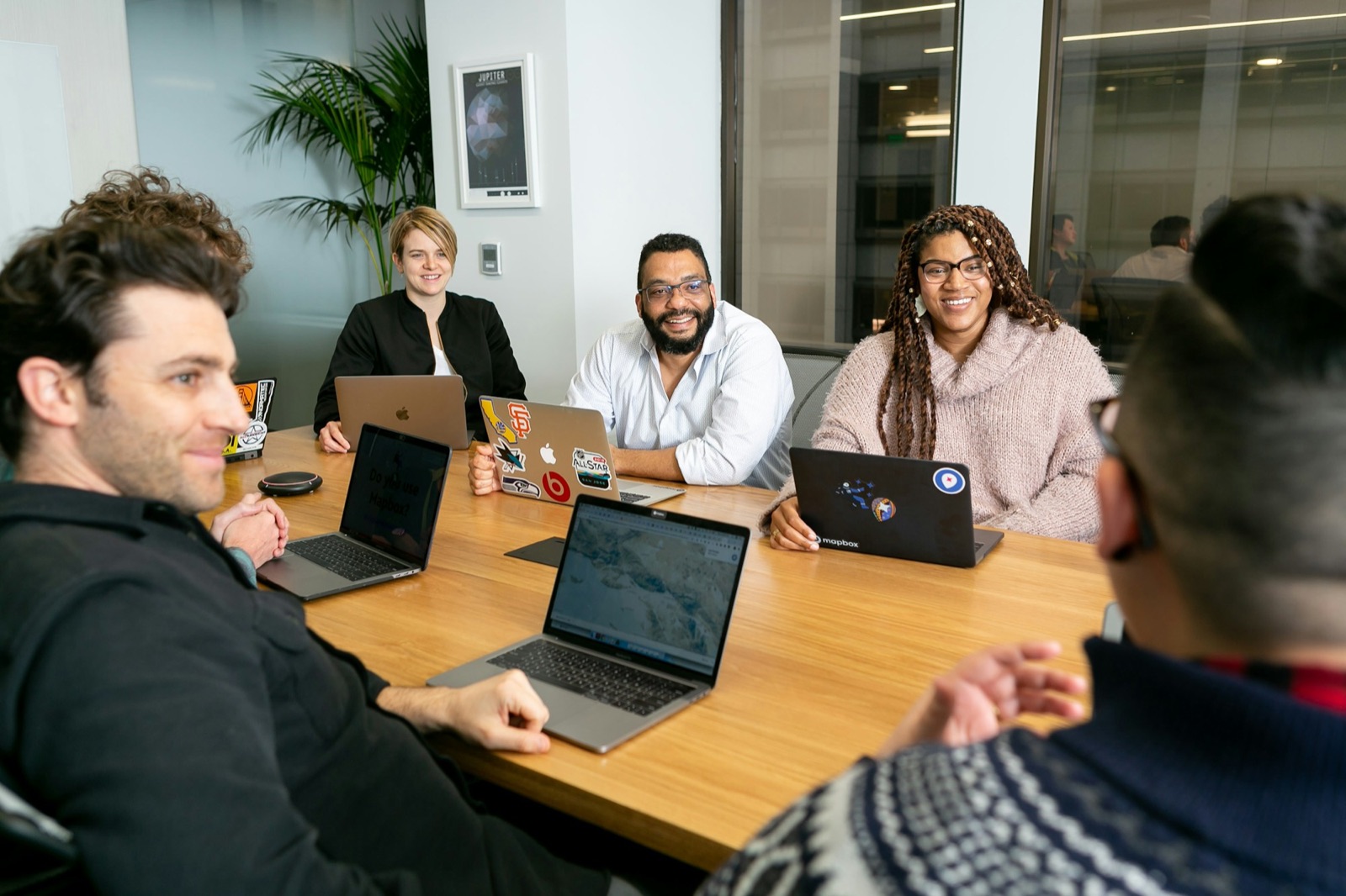 Business team reviewing AI automation results together in a meeting room